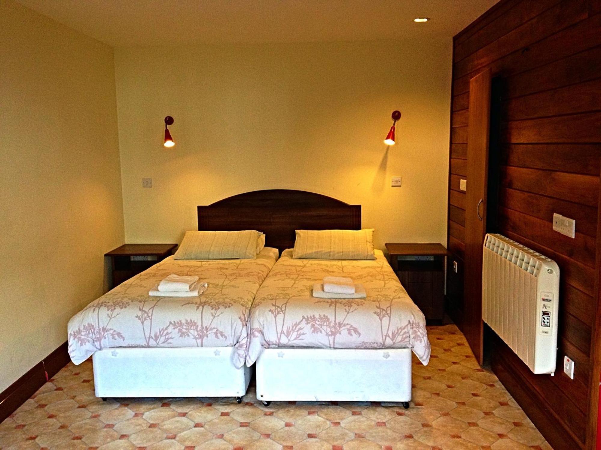 Cashel Town Center Inn Chambre photo